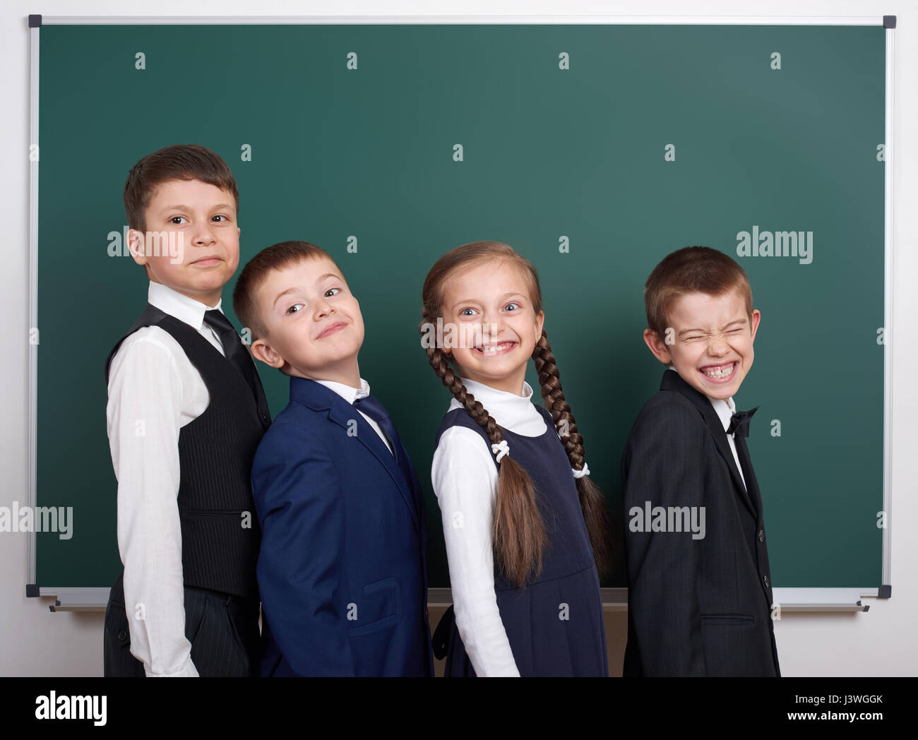 boy at blank chalkboard