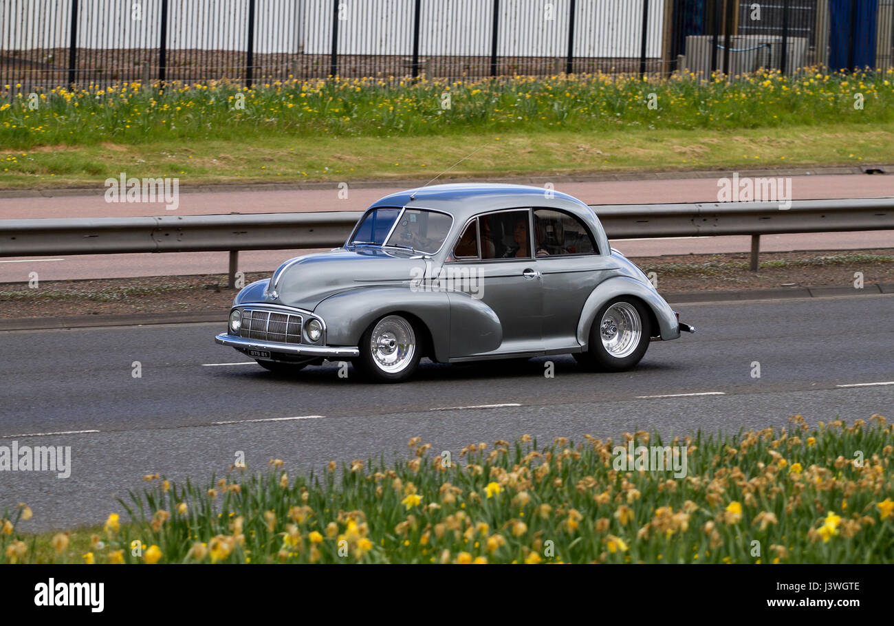 A modified 194950 Morris Minor car travelling along the Kingsway West