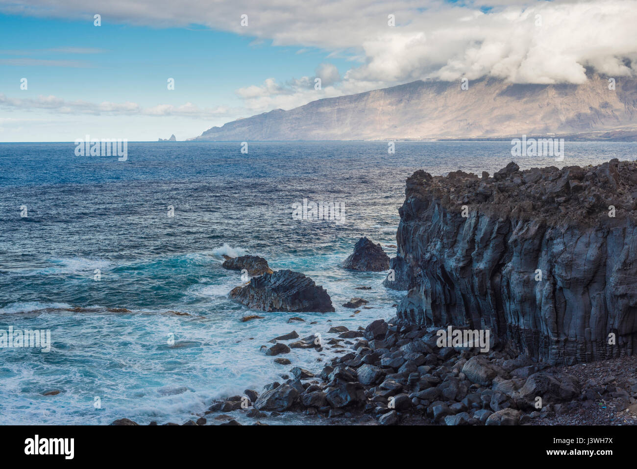 View over El Golfo embayment, El Hierro, Canary Islands, towards the giant cliff of Fuga de Gorreta from Pozo de la Salud Stock Photo