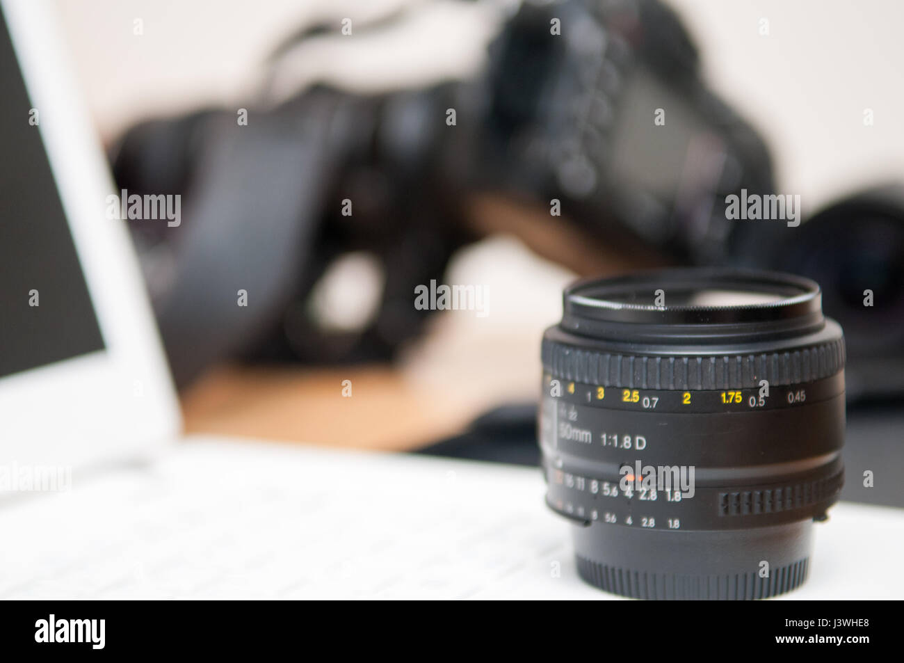 Professional photography editing equipment with camera and laptop Stock