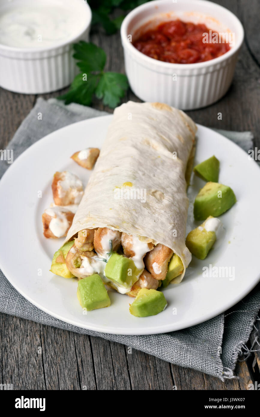 Wrap sandwich with chicken meat and avocado Stock Photo Alamy
