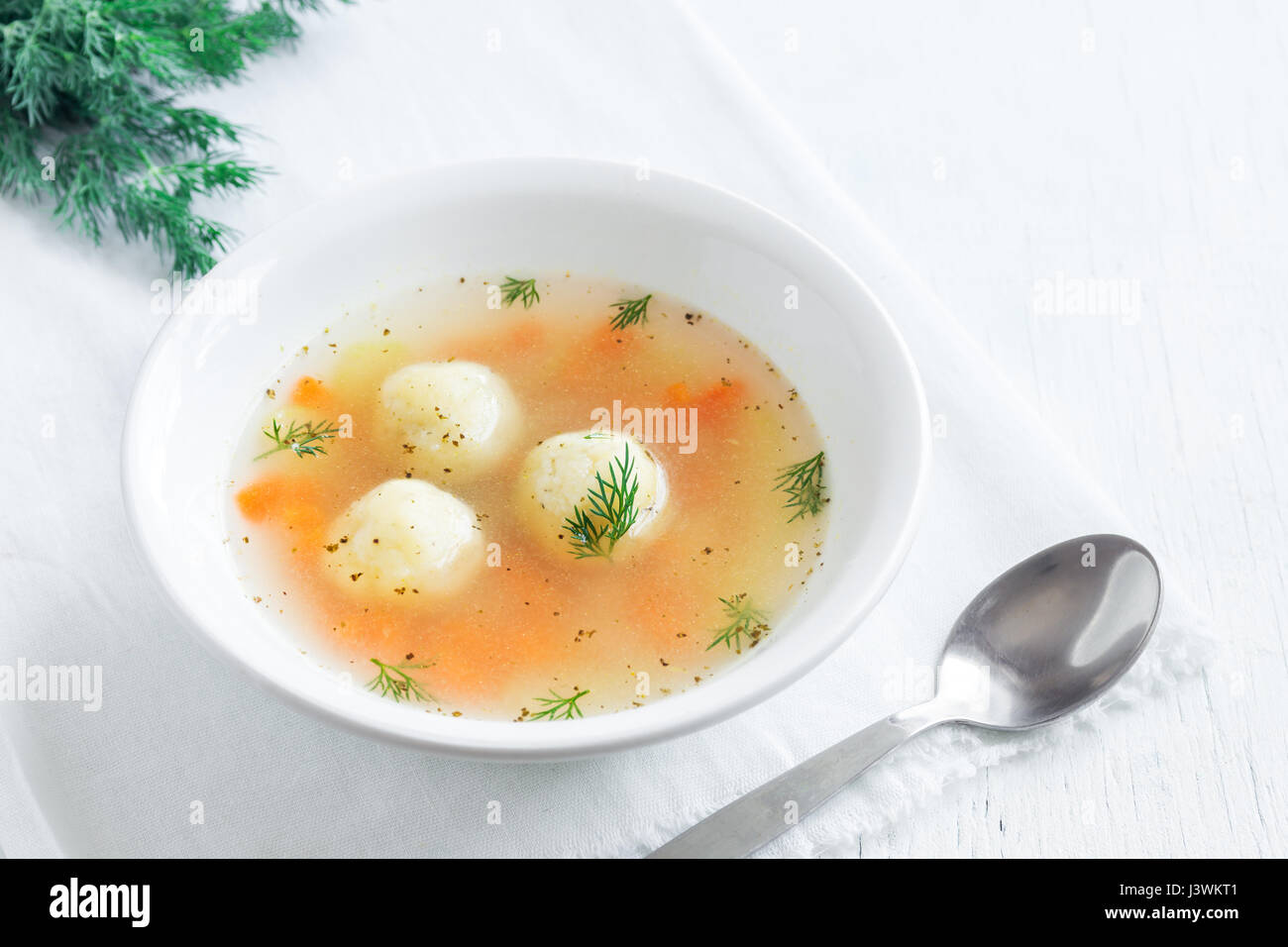 Delicious Matzoh ball soup Jewish traditional cuisine, homemade Matzo Ball soup Stock Photo