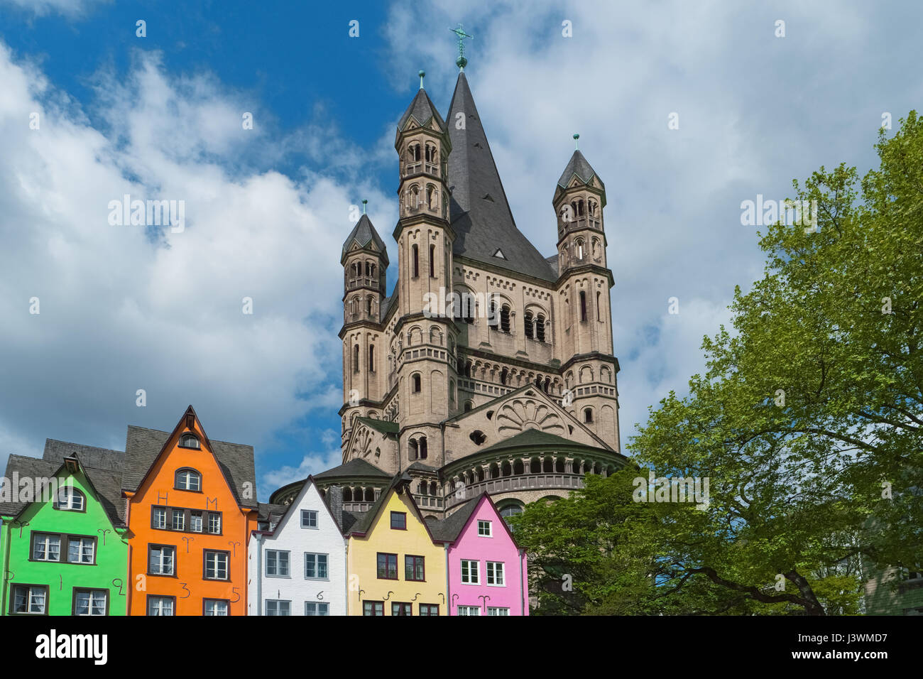 Old houses, St. Martin Church, Cologne, Germany. Facade of colorful
