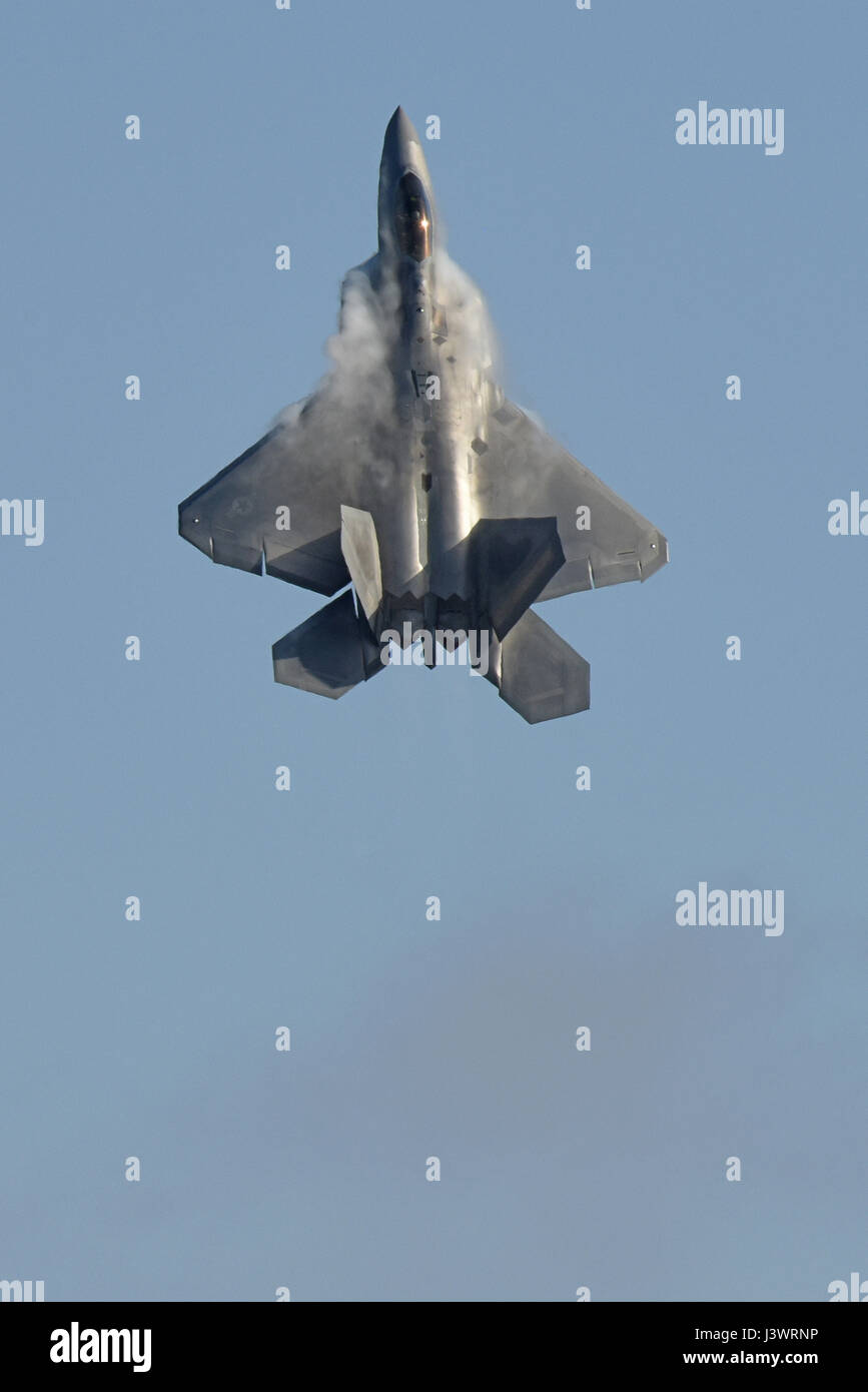 A USAF F-22 Raptor stealth tactical fighter aircraft flies vertically during the Australian Airshow and Aerospace & Defense Exposition aerial demonstration March 3, 2017 in Geelong, Australia.    (photo by John Gordinier /US Air Force  via Planetpix) Stock Photo