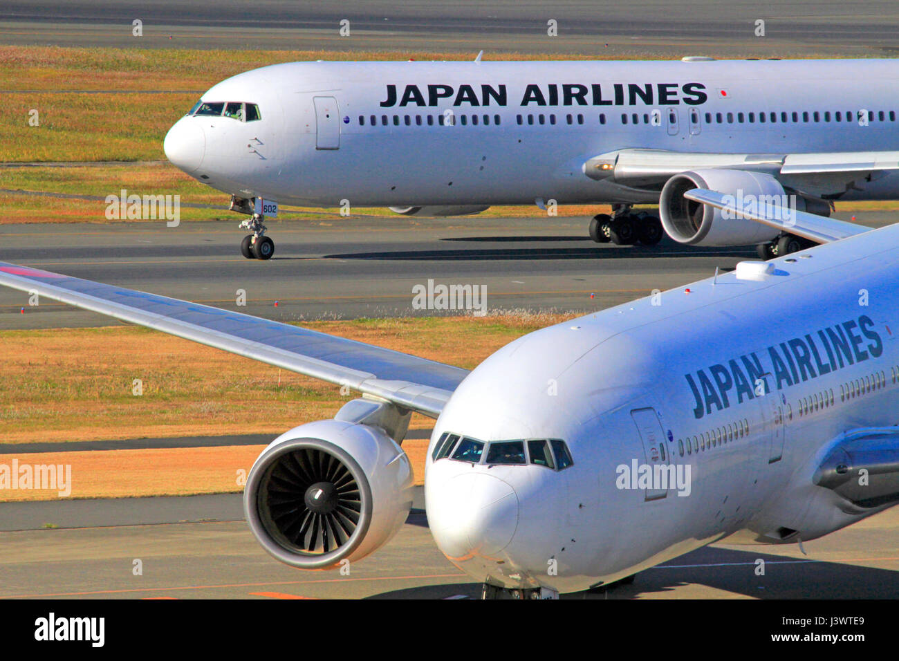 JAL Boeing 767 and 777 at Haneda Airport Tokyo Japan Stock Photo