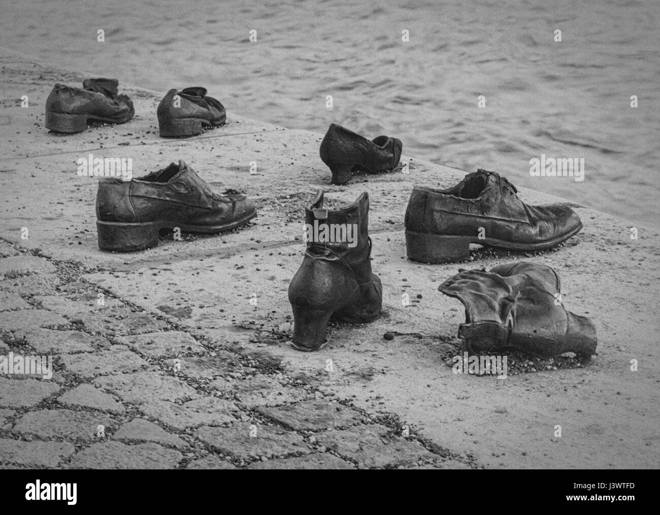 Close up on Iron shoes memorial to Jewish people executed WW2 in Budapest, Hungary Stock Photo