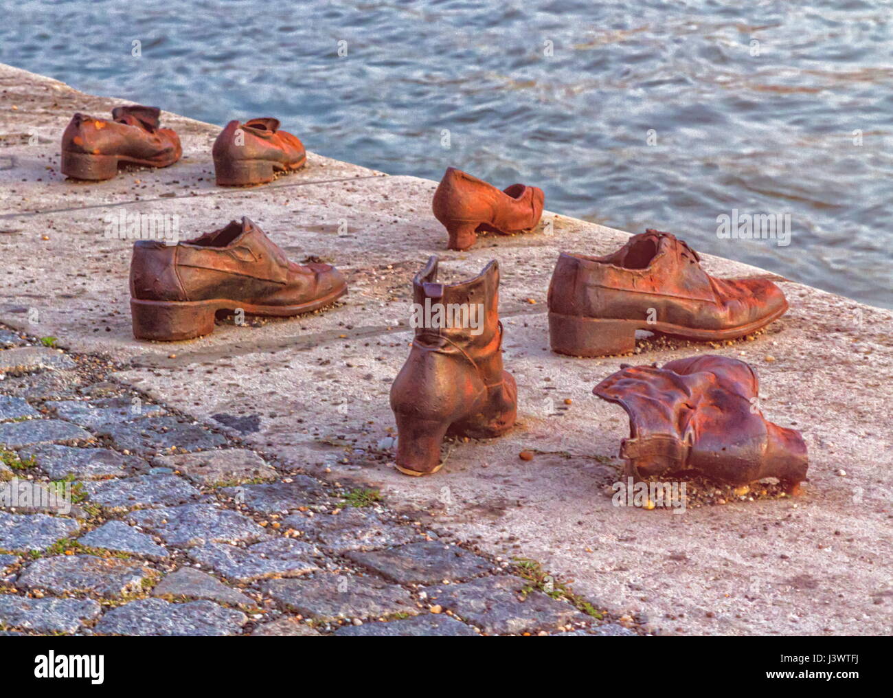 Close up on Iron shoes memorial to Jewish people executed WW2 in Budapest, Hungary Stock Photo