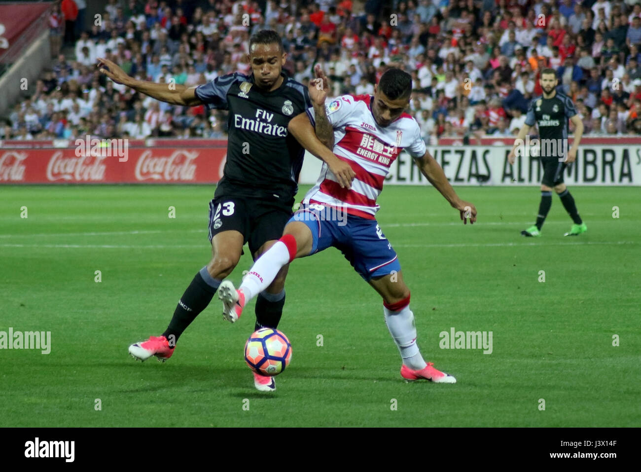 Granada, Spain. May 6, 2017 - Danilo and Andreas Pereira. Real Madrid defeated Granada 0-4 with goals scored by James Rodriguez (3 and 10 minute) and Alvaro Morata (30 and 35 minute). Matchday 36 game played in Los Nuevos Carmenes Stadium. Photo by Jose Velasco | PHOTO MEDIA EXPRESS Stock Photo