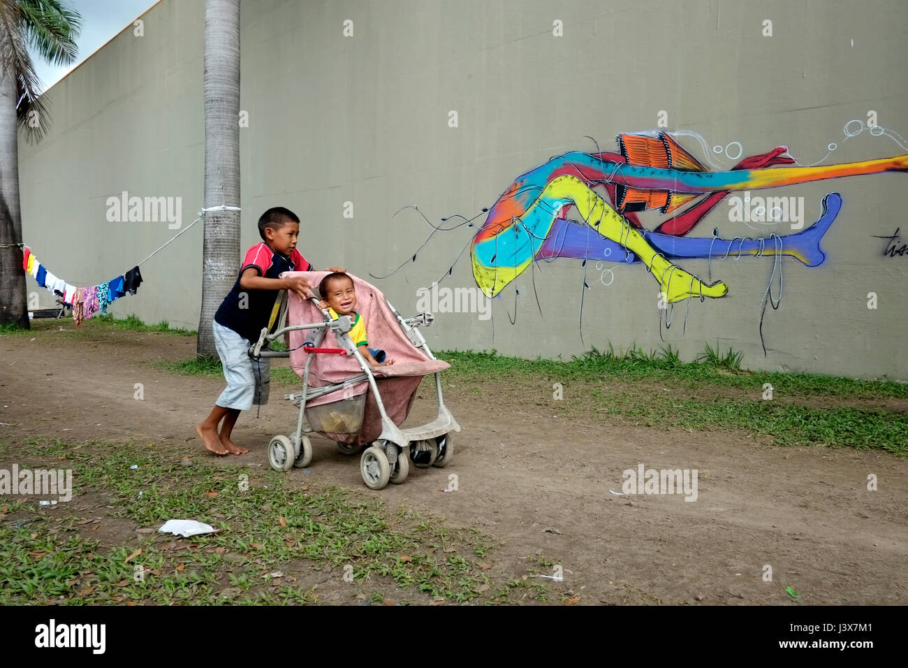 Manaus, 05/08/2017 - AM - Approximately 30 Warao families from Venezuela camped under the flower viaduct near the Manaus bus station in the Central-South region, most of them live in handicrafts, but what attracts attention is which half are children and teenagers. The Warao Indians have fled to Brazil since 2014, when the political and economic crisis in Venezuela worsened, causing lack of food, personal hygiene, medicines, medical care and energy for the population. (Photo: Danilo Mello) Stock Photo