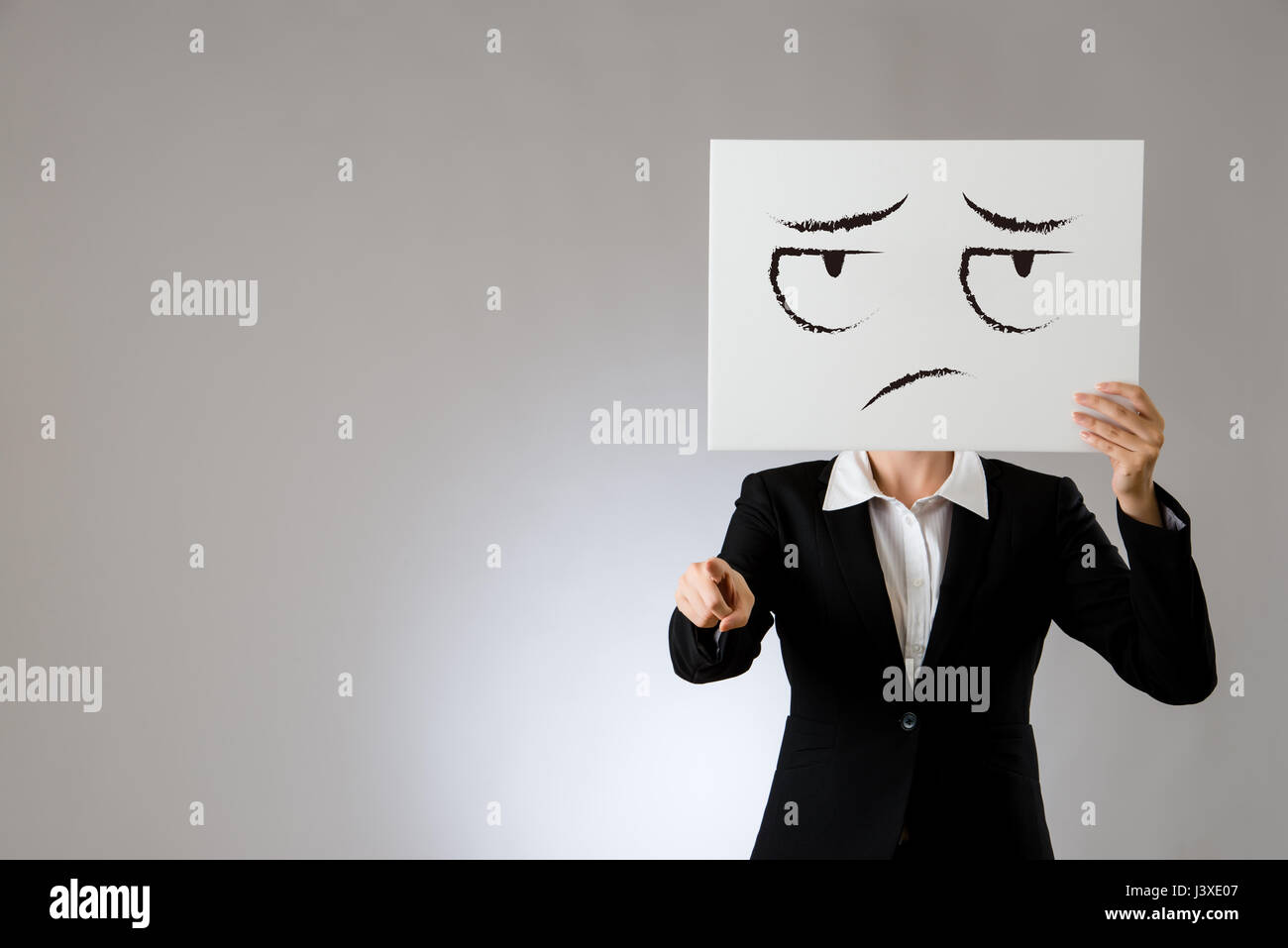 Not Involved Face business woman feel unwilling face draw on blank billboard with ...