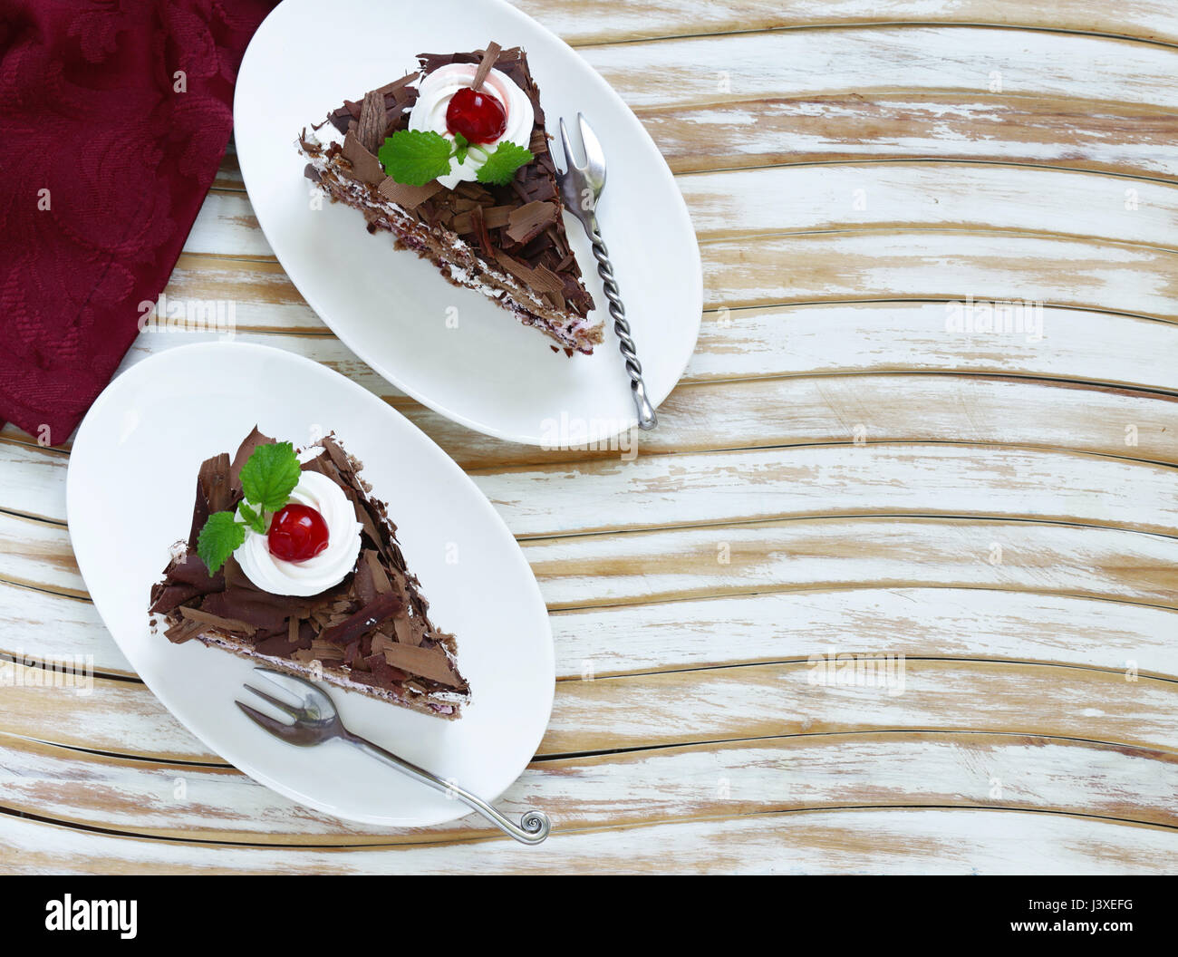 Chocolate cake with fresh berries and whipped cream Stock Photo - Alamy