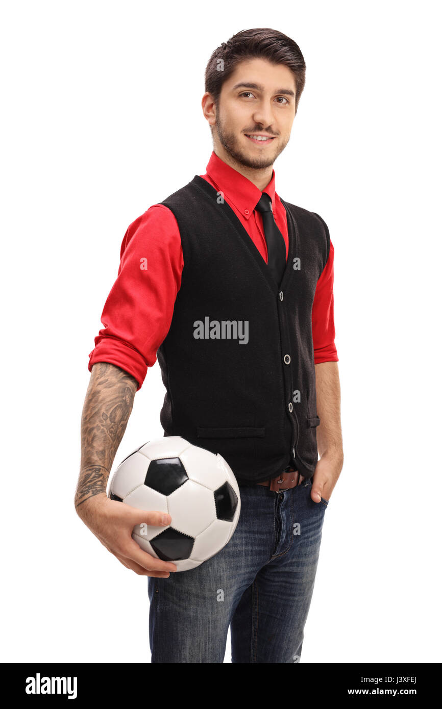 Tattooed guy holding a football and looking at the camera isolated on white background Stock Photo