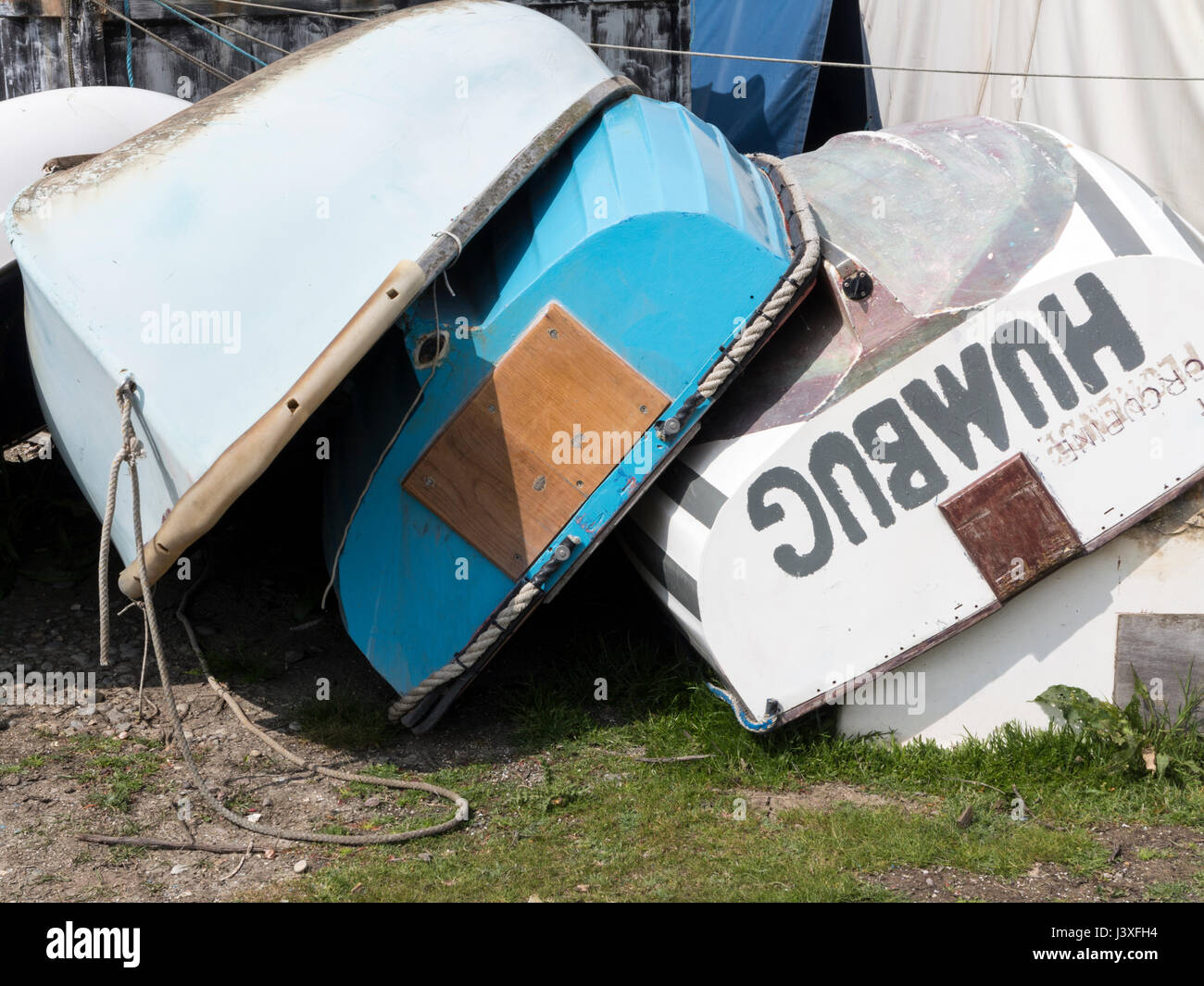 Sailing dinghys stacked in a boat yard Stock Photo