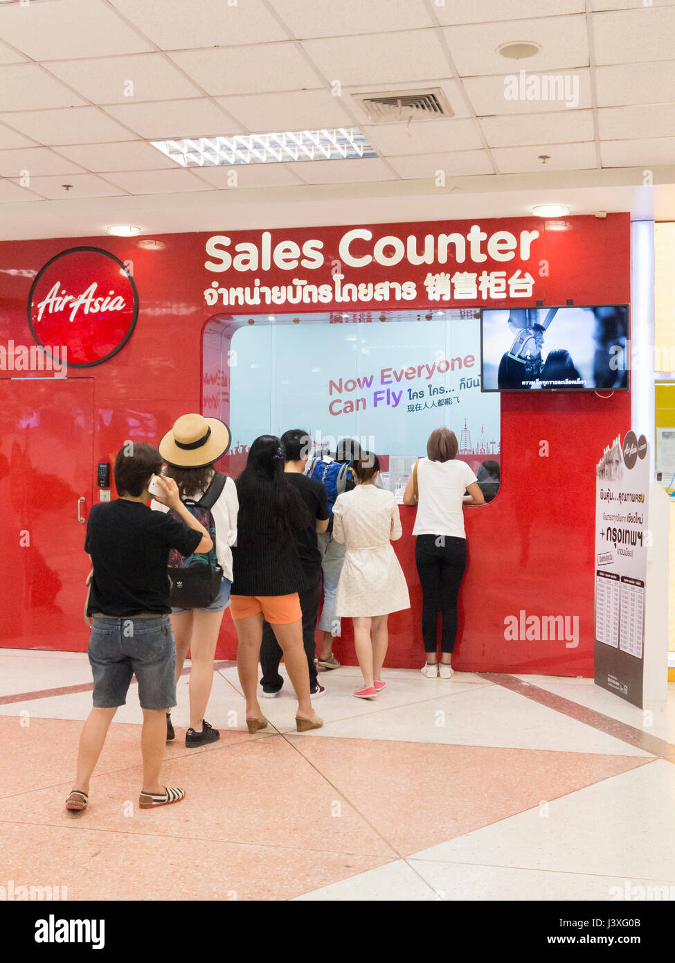 Air Asia airline sales counter inside Chiang Mai international airport, Chiang Mai,   Thailand Stock Photo