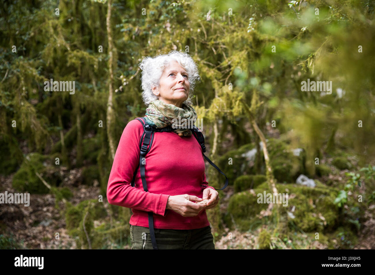 Woman hiker looking up, Bruniquel, France Stock Photo