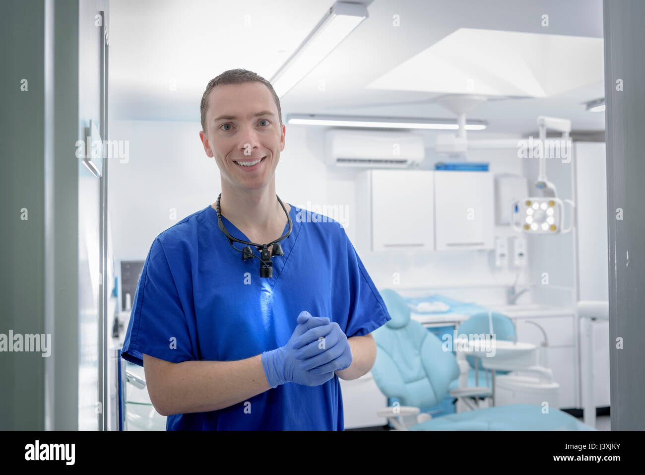 Male dentist in dental surgery Stock Photo