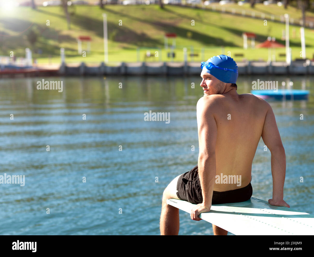 Diver on diving platform, Geelong, Victoria, Australia Stock Photo