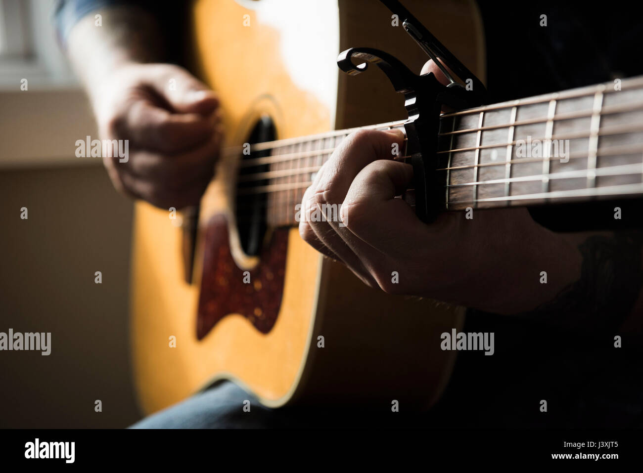 Close up male playing guitar hi-res stock photography and images - Alamy