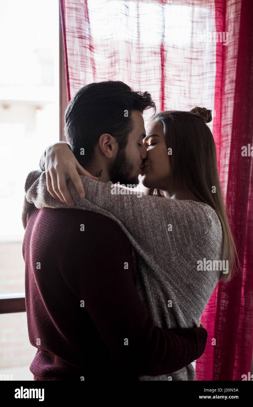 Kissing teenager hi-res stock photography and images - Alamy