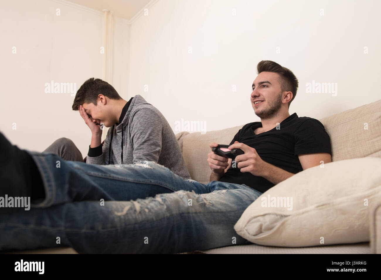Men Relax By Playing Competitive Video Games As Friends In A Local Internet  Bar That Specializes In Online Gaming Stock Photo, Picture and Royalty Free  Image. Image 81203430.