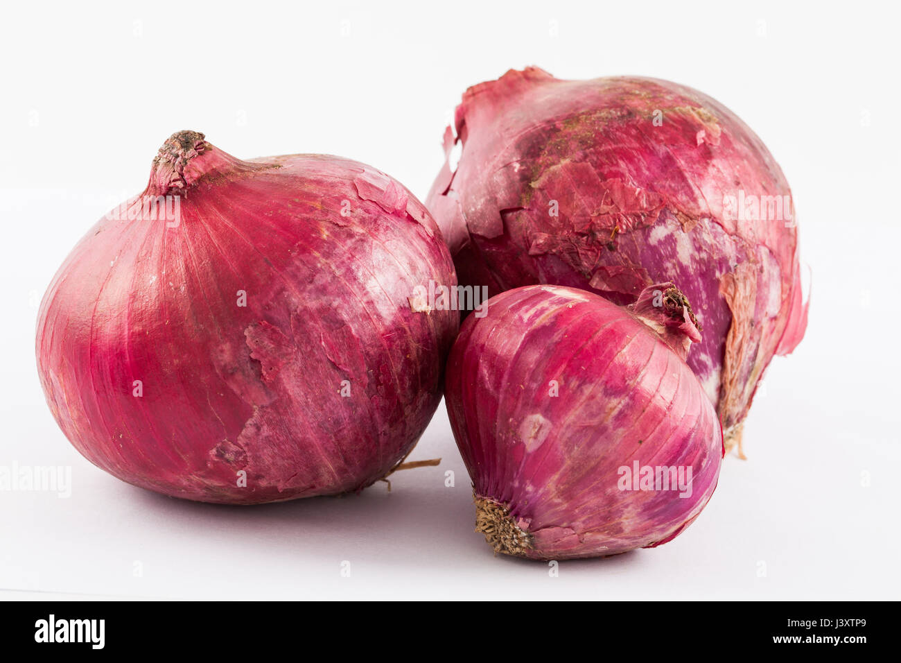 Red bulb onion (Allium cepa) isolated in white background Stock Photo