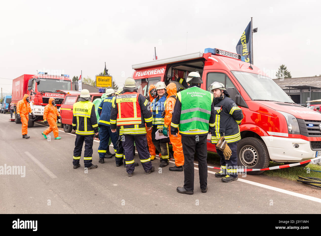 Fireman demonstrate how to handle hazardous material - public demonstration May 2017 in Bleialf, Eifel, Rheinland-Pfalz, Germany, Europe, EU Stock Photo