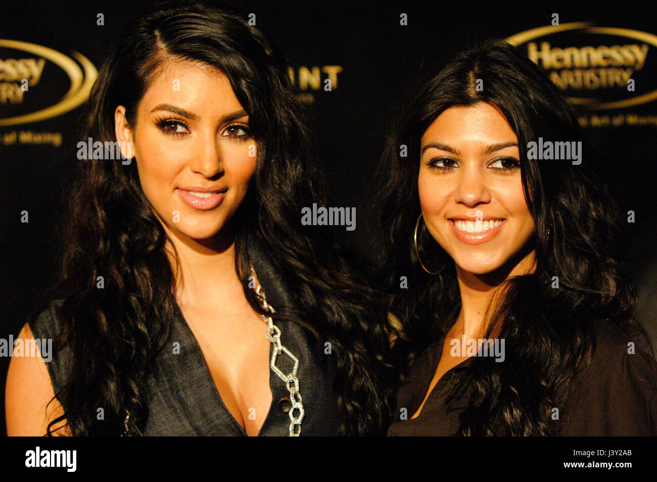 Kim Kardashian and sister Kourtney Kardashian arrives to the Hennessy