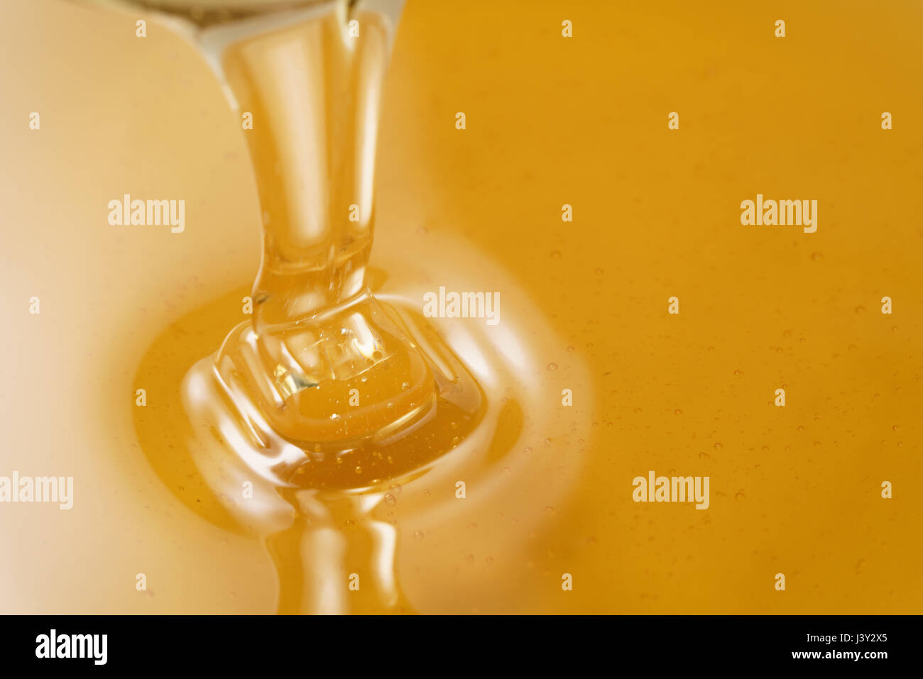 closeup of pouring organic honey with copy space Stock Photo Alamy