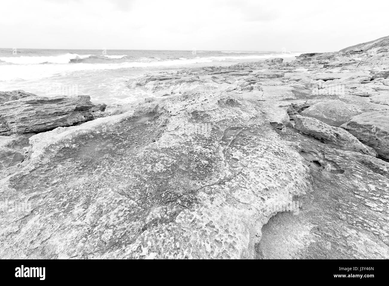 blur in south africa   sky ocean  isimagaliso reserve nature and rocks Stock Photo