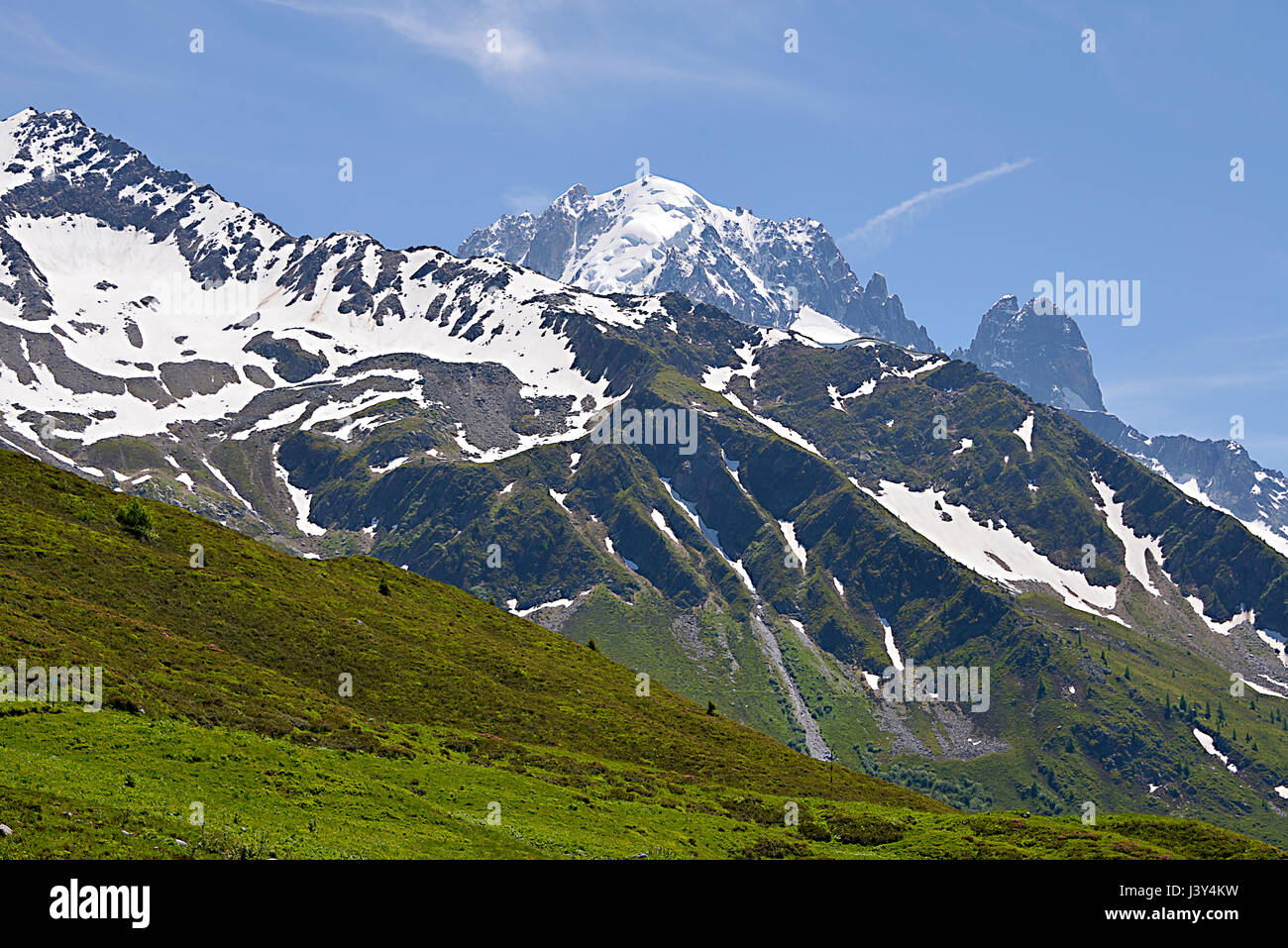 Partly snowy mountain at Charamillon which depends on the commune Le Tour (1462m) near of Chamonix in the French Alps in the Haute-Savoie department Stock Photo