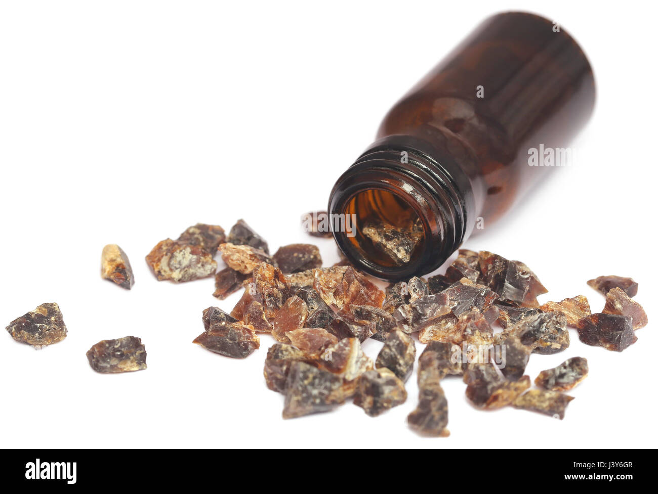 Frankincense dhoop with essential oil over white background Stock Photo