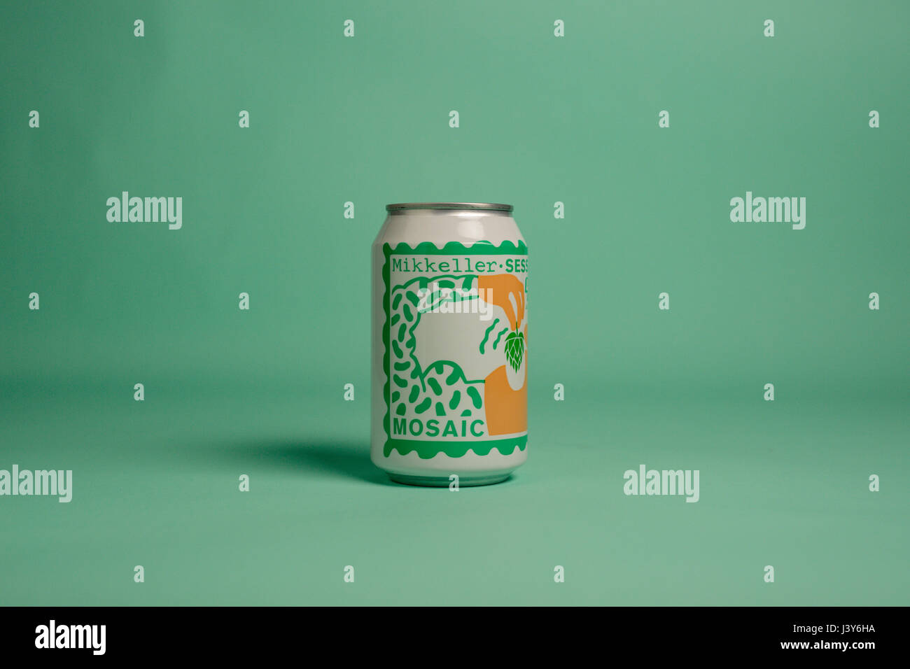 can of mikkeller session ipa mosaic against a green studio background Stock Photo