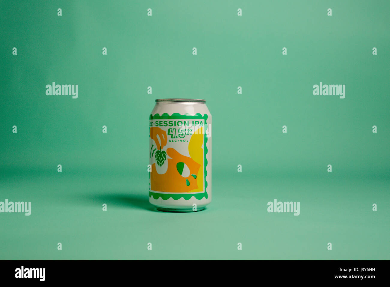can of mikkeller session ipa mosaic against a green studio background Stock Photo