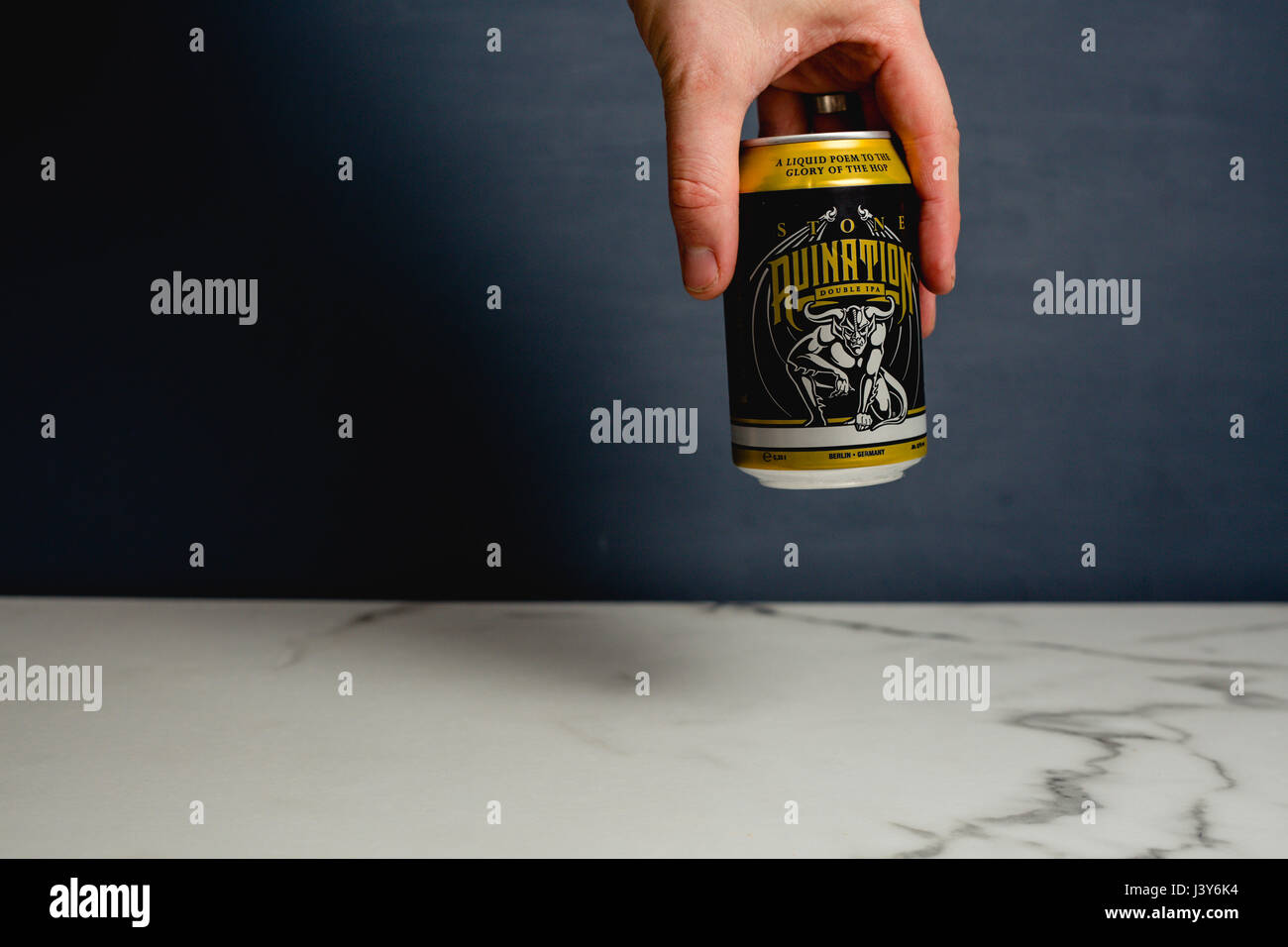 Can of San Diego Brewery Stone Ruination brewed by Stone Berlin in a studio setting with marble and a grey background Stock Photo