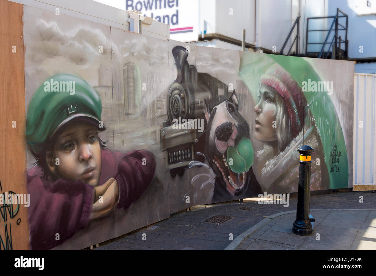 Wall mural by Nomad Clan on hoardings at the Hotel Indigo building site, Corporation Street, Manchester, England, UK Stock Photo