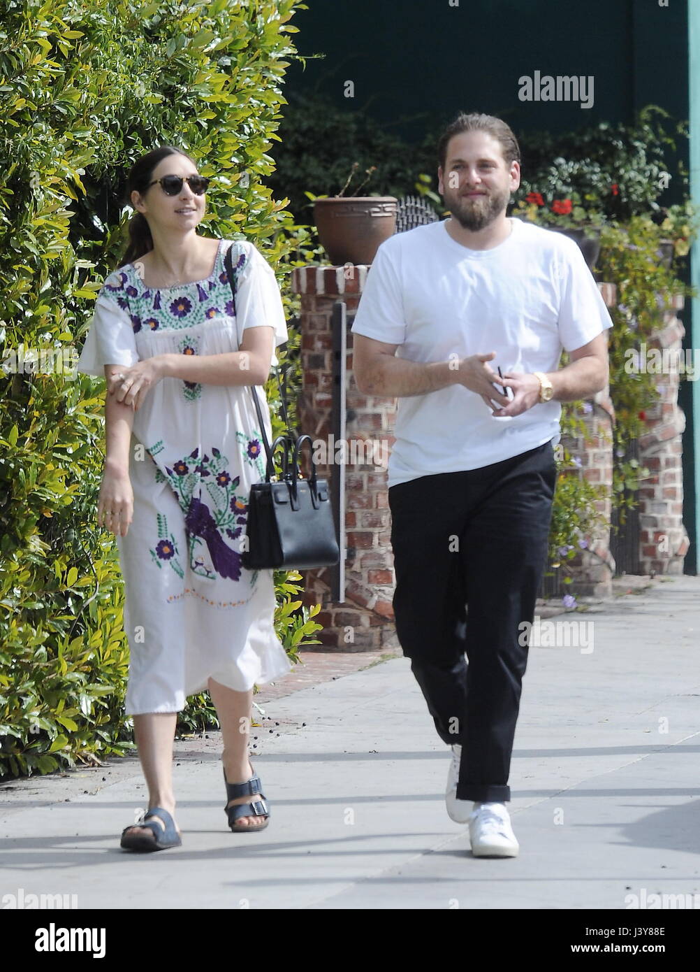 A slimmed down Jonah Hill out and about with a female friend  Featuring: Jonah Hill Where: Los Angeles, California, United States When: 07 Apr 2017 Stock Photo