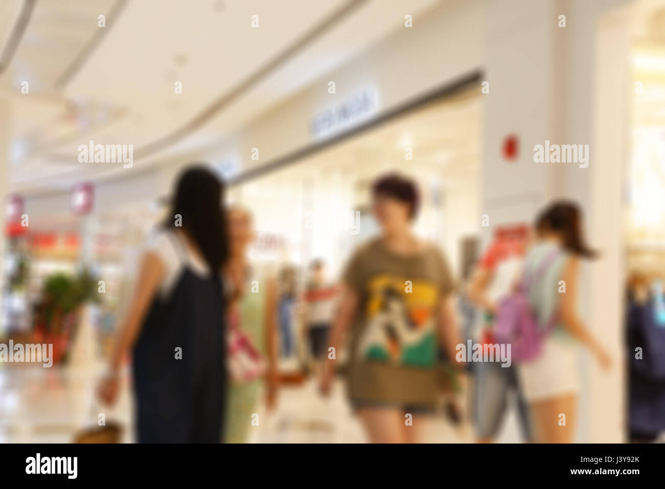 People in the center of the beautiful shopping promenade.Defocusing background material Stock Photo