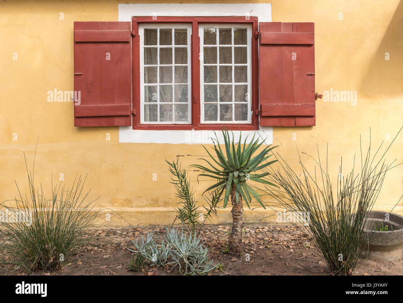 Garden and window of a parsonage in Genadendal. Genadendal is the first mission station in South Africa, founded 1738 Stock Photo