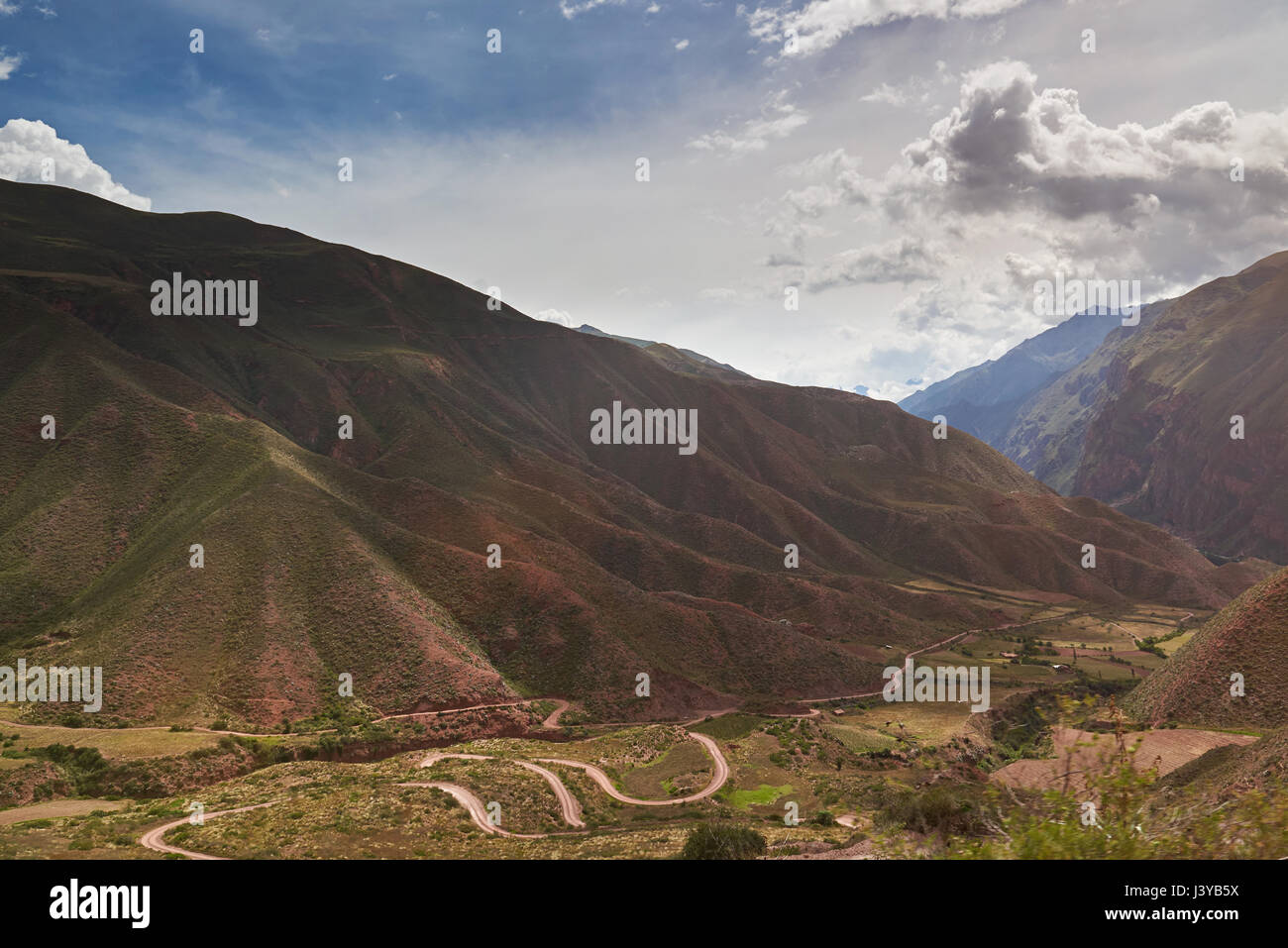 Andes mountain summer landscape in Peru. Mountain road on sunny day Stock Photo