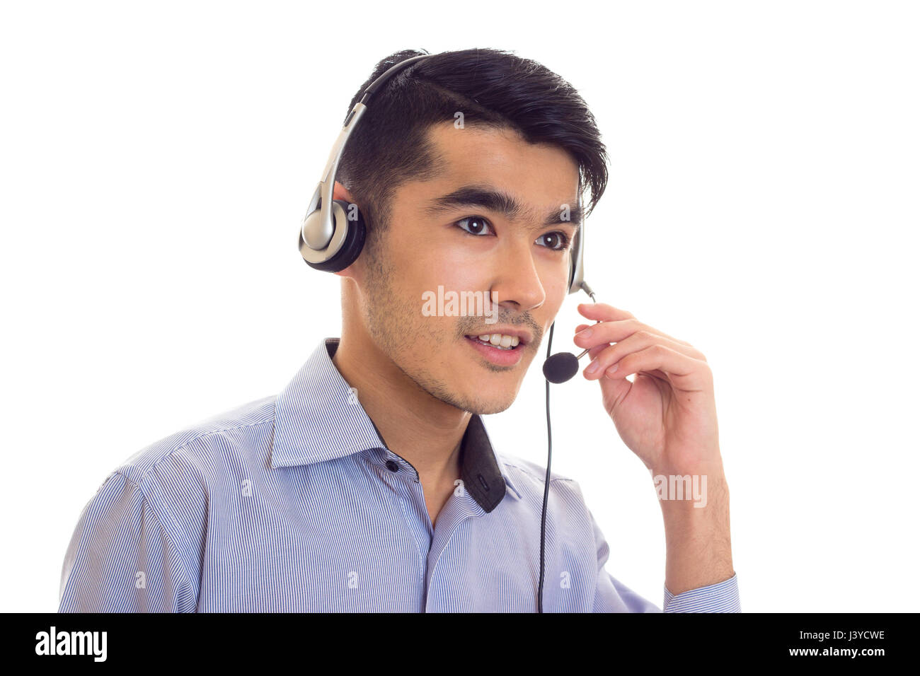 Young man using headphones  Stock Photo