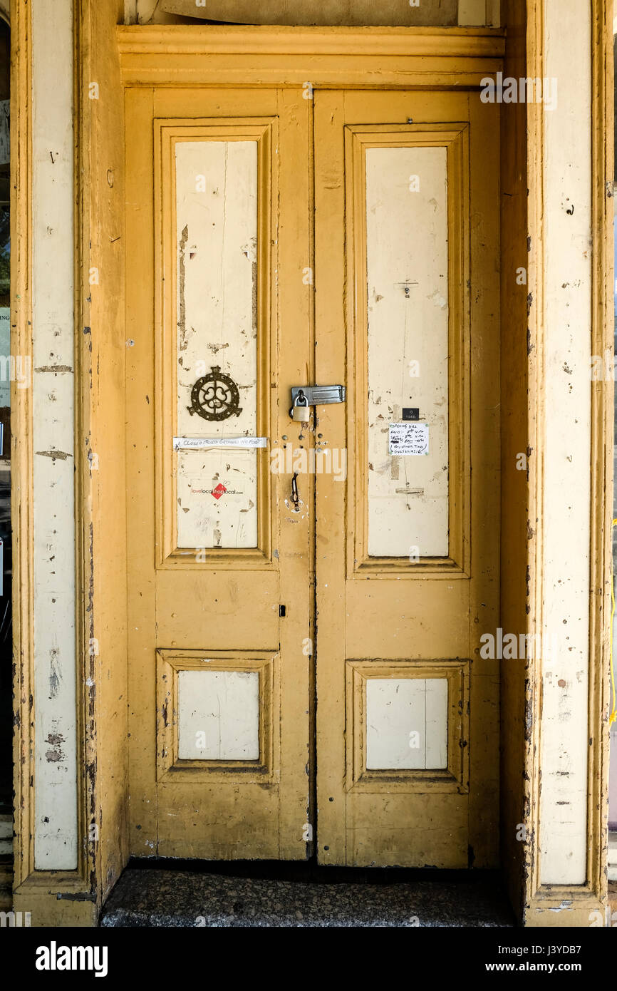 Old yellow door in Yackandandah, Victoria, Australia Stock Photo