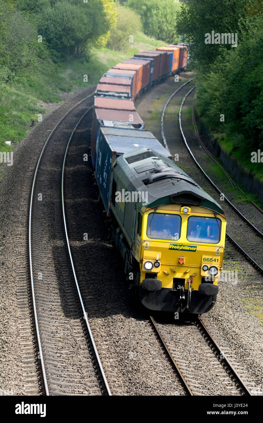 Class 66 diesel locomotive pulling a freightliner train at Hatton Bank, Warwickshire, UK Stock Photo