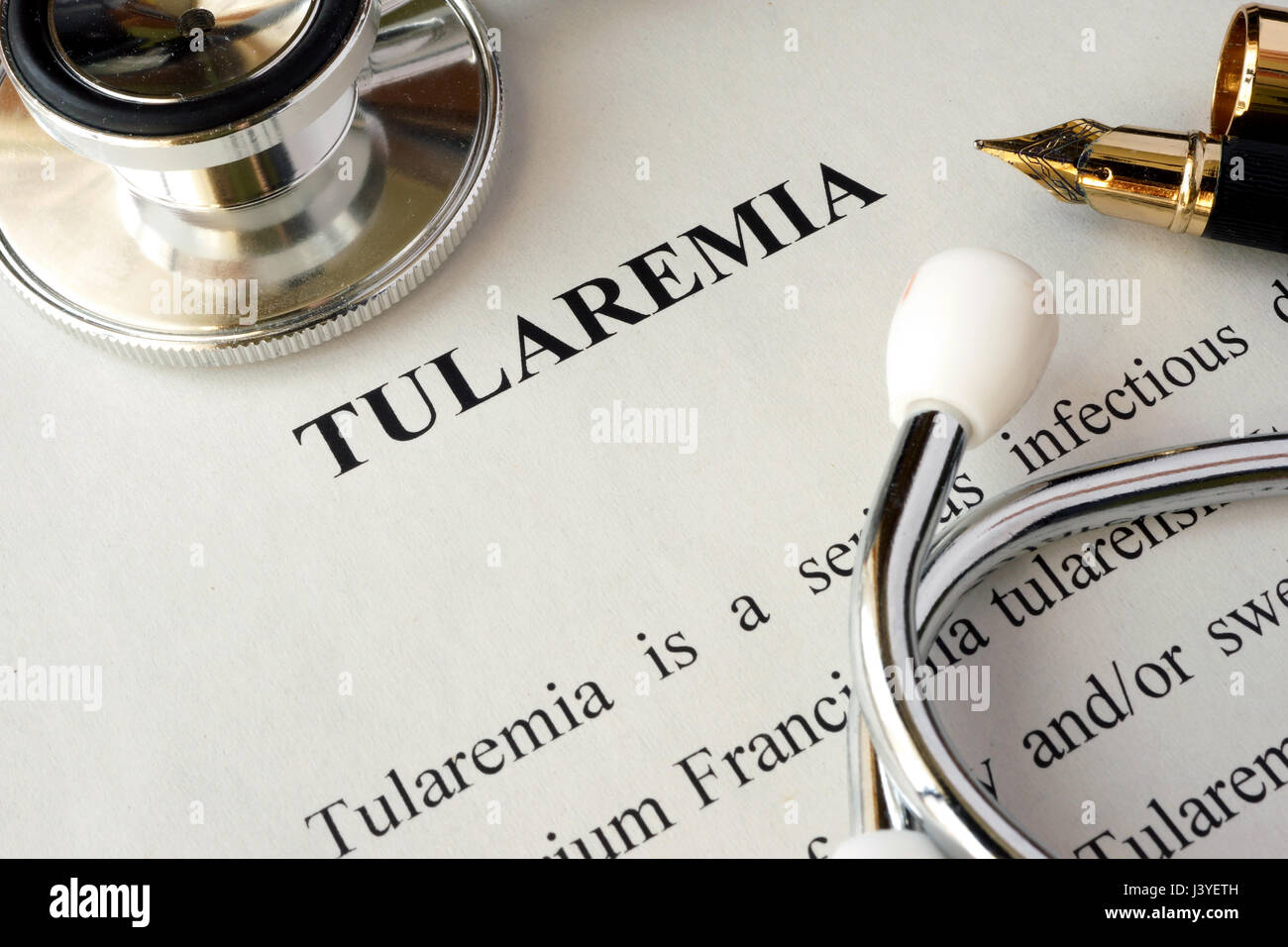 Page with title tularemia on a table. Stock Photo