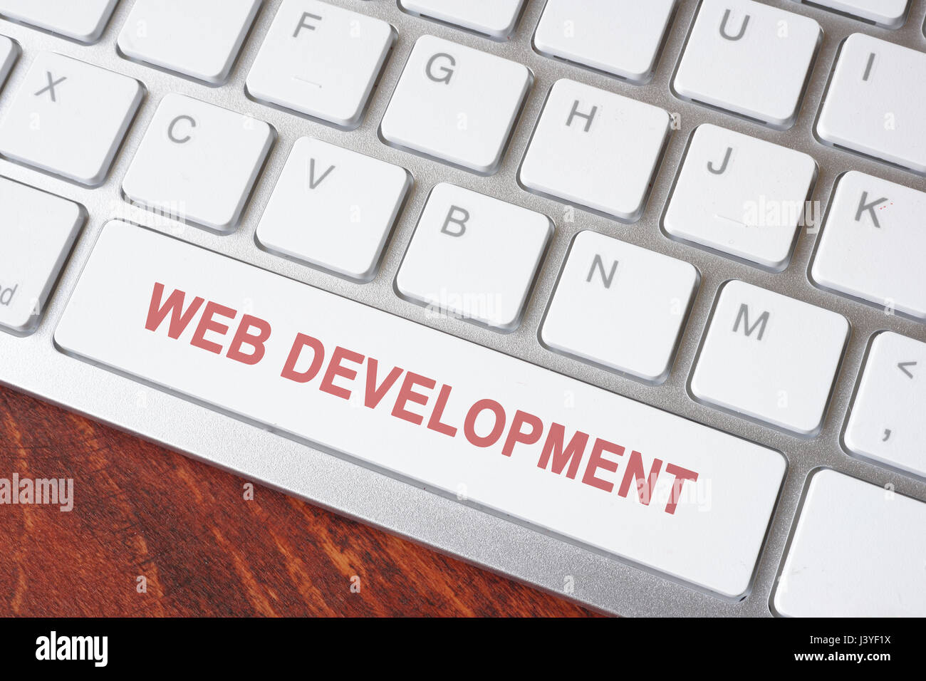 Button of keyboard with words Web development. Stock Photo