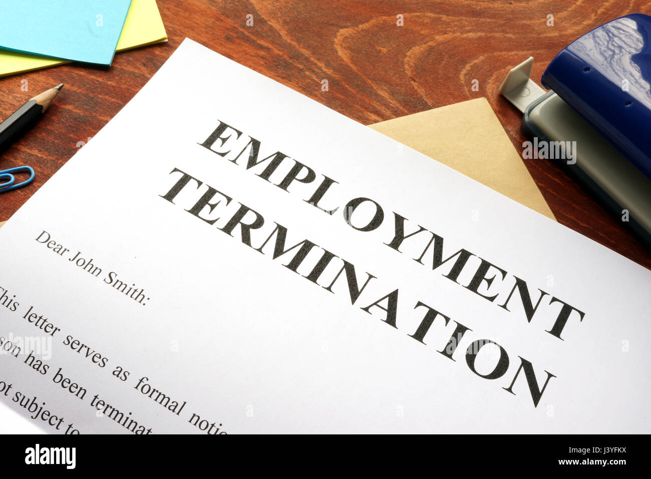 Emploinment termination letter. Unfair dismissal concept. Stock Photo