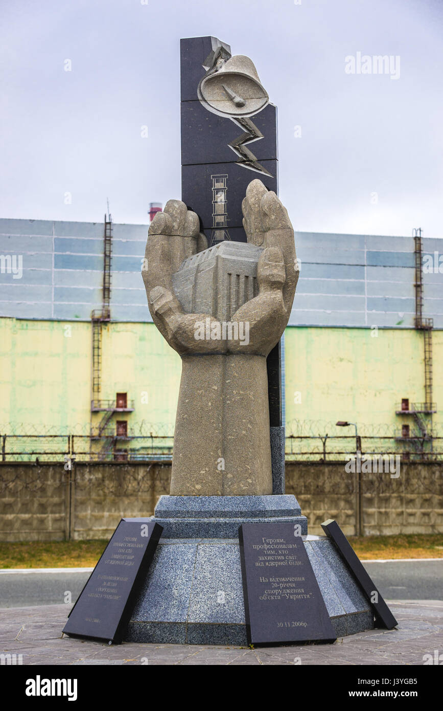 Monument to the Chernobyl Victims in front of Chernobyl Nuclear Power Plant in Zone of Alienation, Ukraine Stock Photo