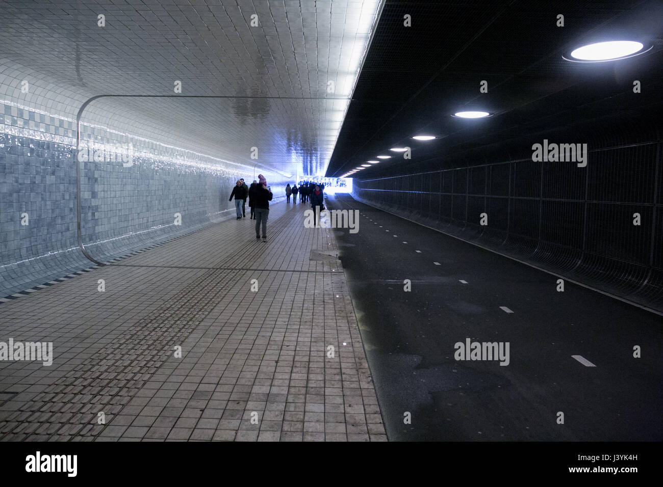people walking at subway passage in Amsterdam Ceentral Station Stock Photo