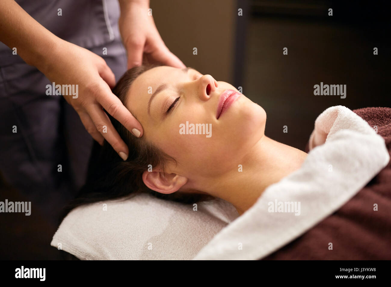 woman having head massage at spa Stock Photo Alamy