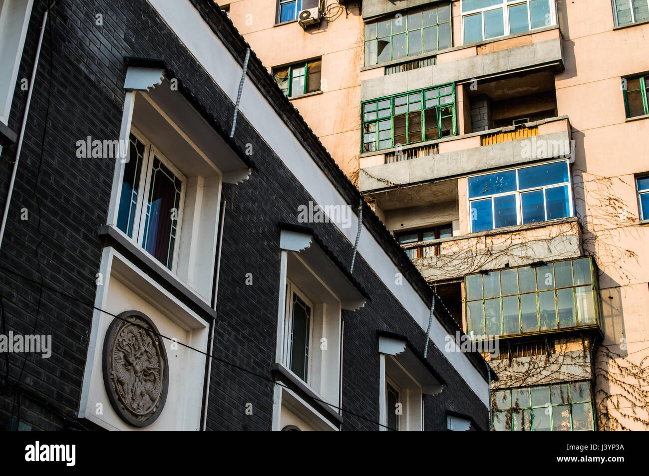 Old and Renovated Apartment Buildings in Juxtaposition, Beijing, China Stock Photo