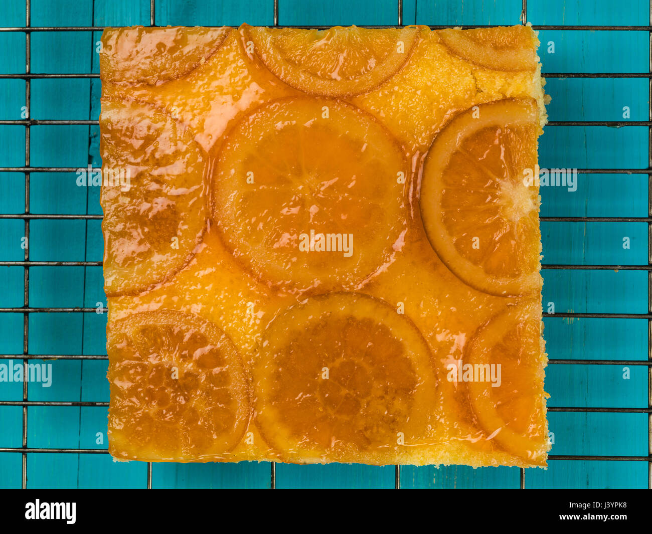 Glazed Candied Orange Sponge Cake Stock Photo Alamy